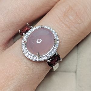 Pink Chalcedony and Garnet ring set in rhodium plated sterling silver.